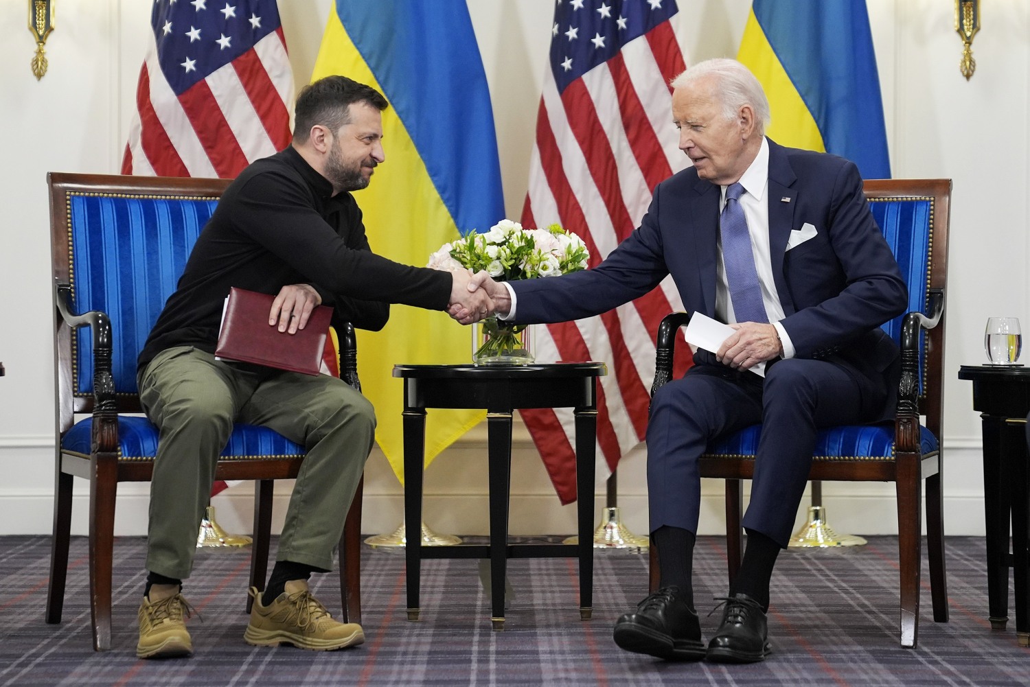 Biden meets with Zelenskyy in Paris, apologizes for U.S. weapons delay that let Russia make gains